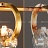 Рядный светильник с круглыми плафонами в виде кристаллов на золотых кольцах ADONICA LONG 12 ламп фото 6
