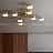 Серия потолочных светодиодных люстр с дисковидными плафонами на тонких угловых штангах латунного оттенка DAHLIA B фото 6