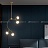 Серия дизайнерских люстр со стеклянными шарообразными плафонами на изогнутых рейках MELLA A фото 6