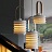Серия подвесных светильников в виде белых рифленых фонарей с деревянной ручкой ROINE фото 2